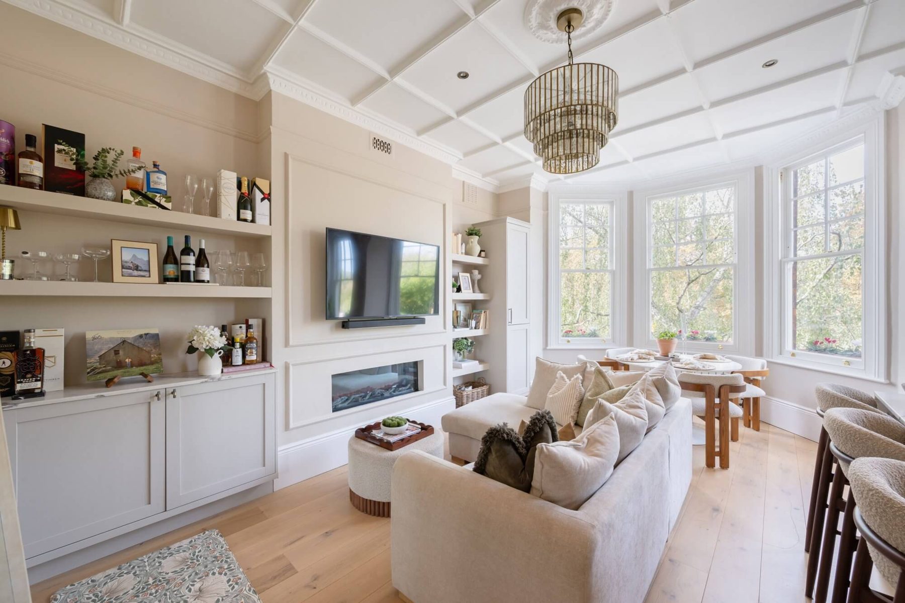 Clapham living room with bay window and styled shelving