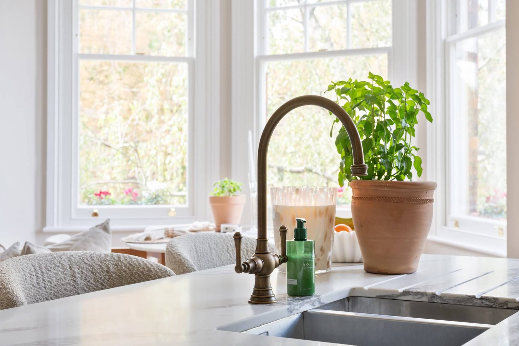 Aged brass kitchen tap detail